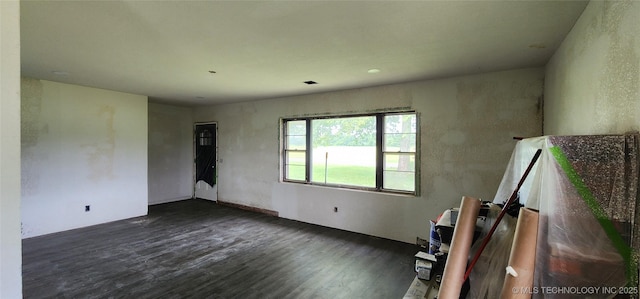 14505 S 145th E Ave, Bixby, OK 74008 - empty room featuring dark wood-style floors