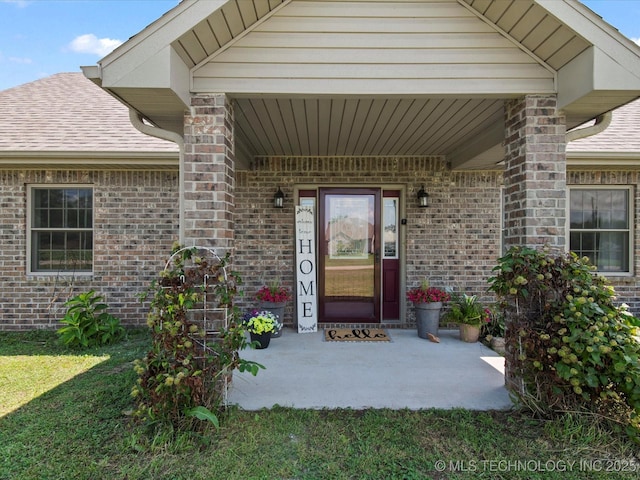 16145 Ew 255 Rd, Nowata, OK 74048 - doorway to property with brick siding