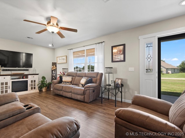 16145 Ew 255 Rd, Nowata, OK 74048 - living room featuring wood finished floors, a ceiling fan, and recessed lighting