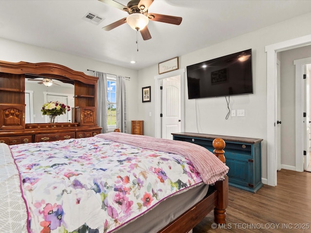 16145 Ew 255 Rd, Nowata, OK 74048 - bedroom with wood finished floors and a ceiling fan