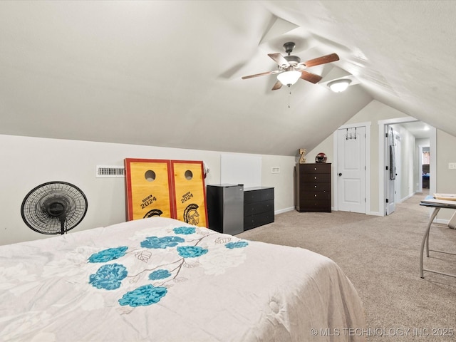 16145 Ew 255 Rd, Nowata, OK 74048 - bedroom with lofted ceiling, carpet, and ceiling fan