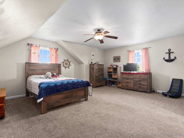 16145 Ew 255 Rd, Nowata, OK 74048 - carpeted bedroom with multiple windows, a ceiling fan, and vaulted ceiling