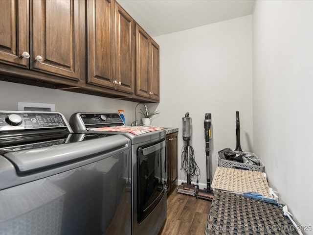 16145 Ew 255 Rd, Nowata, OK 74048 - laundry room with cabinet space, washing machine and dryer, and dark wood-style flooring