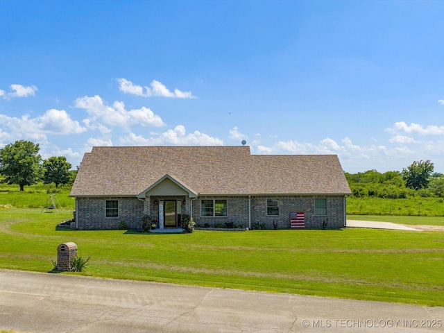 16145 Ew 255 Rd, Nowata, OK 74048 - view of front of home featuring a front yard, brick siding, and roof with shingles