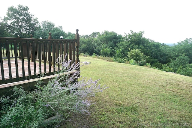710 N 14th St, Henryetta, OK 74437 - view of grassy yard with a deck