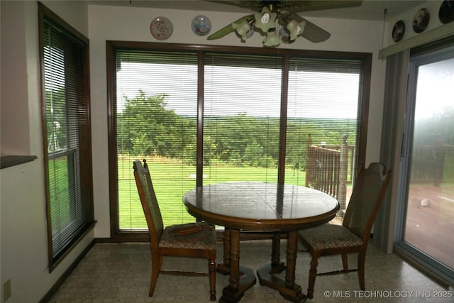 710 N 14th St, Henryetta, OK 74437 - dining area with a ceiling fan and light floors