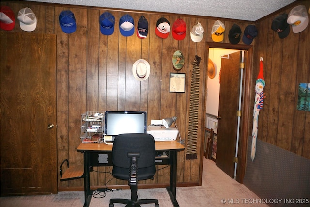 710 N 14th St, Henryetta, OK 74437 - office space with wood walls, carpet floors, and a textured ceiling