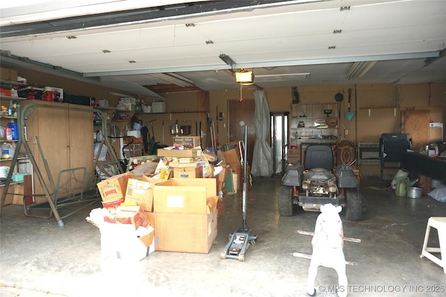 710 N 14th St, Henryetta, OK 74437 - garage featuring a garage door opener
