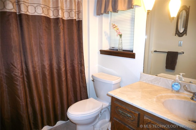 710 N 14th St, Henryetta, OK 74437 - full bathroom featuring vanity and toilet