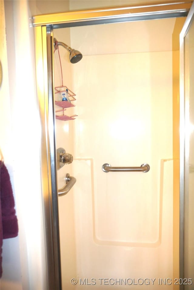 710 N 14th St, Henryetta, OK 74437 - bathroom with an enclosed shower