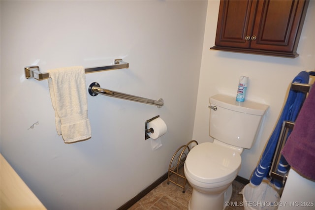 710 N 14th St, Henryetta, OK 74437 - bathroom featuring toilet
