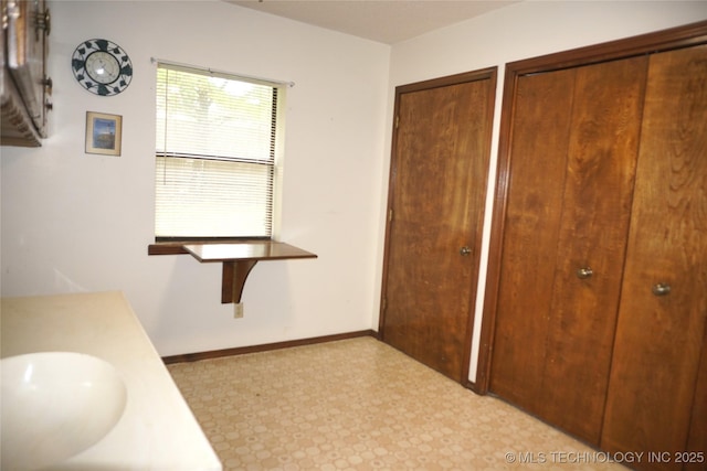 710 N 14th St, Henryetta, OK 74437 - bathroom featuring tile patterned floors