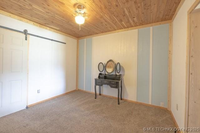 604 N N W, Konawa, OK 74849 - carpeted spare room with wood ceiling and a barn door