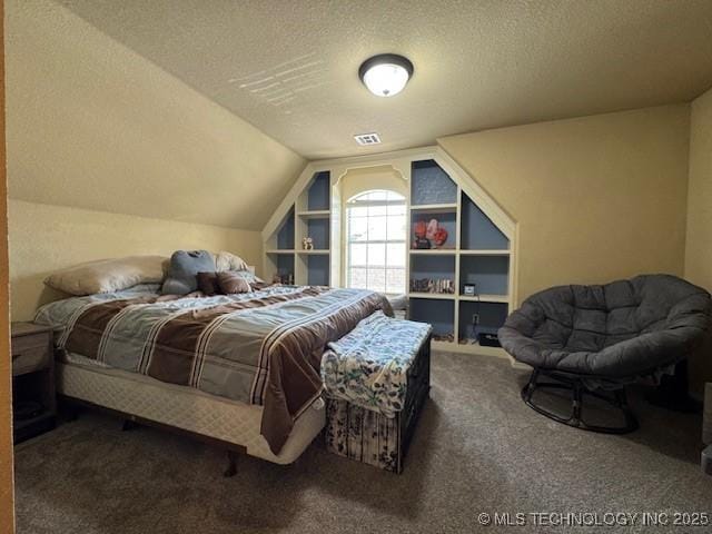 2511 E 138th St S, Bixby, OK 74008 - bedroom featuring a textured ceiling, carpet flooring, and lofted ceiling