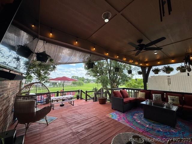 2511 E 138th St S, Bixby, OK 74008 - wooden deck featuring an outdoor hangout area and a ceiling fan