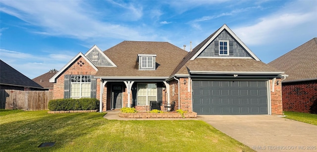 10219 N 119th E Ave, Owasso, OK 74055 - view of front facade with brick siding, driveway, and roof with shingles