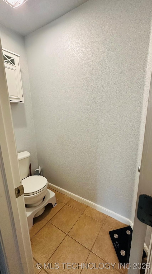 10219 N 119th E Ave, Owasso, OK 74055 - bathroom featuring tile patterned floors and toilet