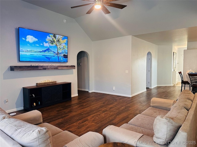 10219 N 119th E Ave, Owasso, OK 74055 - living room with arched walkways, a ceiling fan, lofted ceiling, and wood finished floors