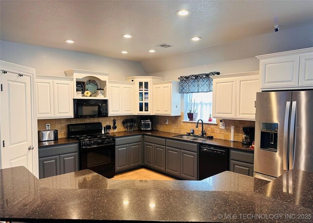 10219 N 119th E Ave, Owasso, OK 74055 - kitchen featuring black appliances, recessed lighting, white cabinetry, tasteful backsplash, and a textured ceiling