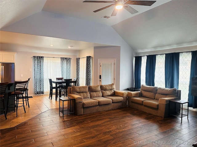 10219 N 119th E Ave, Owasso, OK 74055 - living room with vaulted ceiling, hardwood / wood-style floors, and a ceiling fan