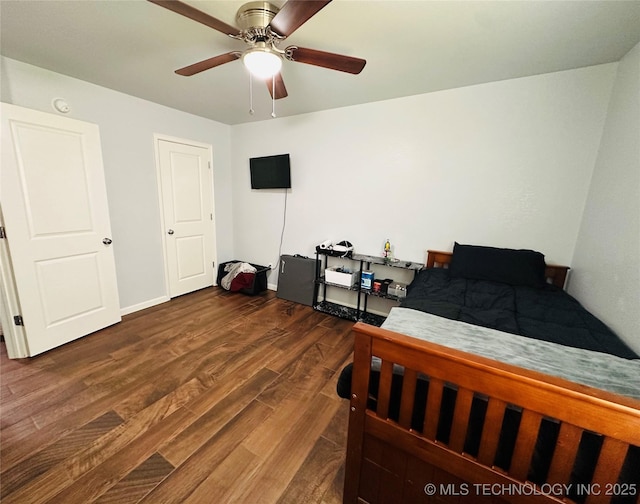 10219 N 119th E Ave, Owasso, OK 74055 - bedroom with dark wood finished floors and a ceiling fan