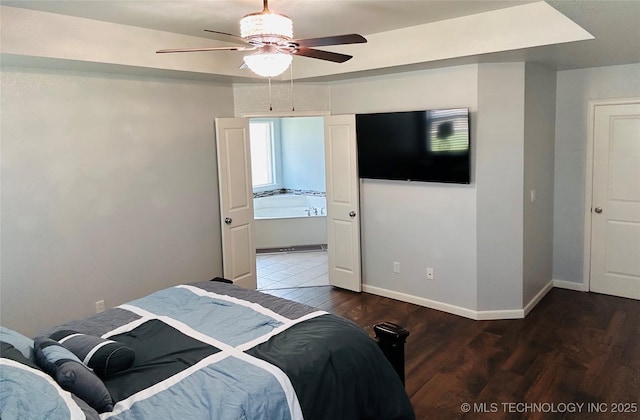10219 N 119th E Ave, Owasso, OK 74055 - bedroom with wood finished floors and ceiling fan