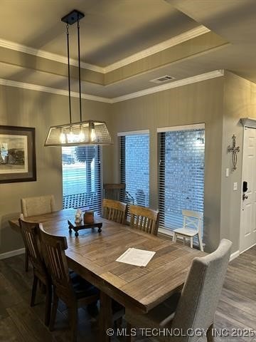 1821 W Lincoln St N, Broken Arrow, OK 74012 - dining area with a tray ceiling, wood finished floors, and ornamental molding