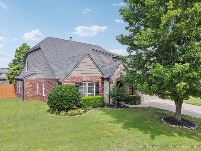 11710 S Willow St, Jenks, OK 74037 - view of front of property featuring brick siding, roof with shingles, and concrete driveway