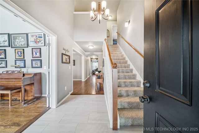 11710 S Willow St, Jenks, OK 74037 - foyer with a chandelier, stairway, and a high ceiling