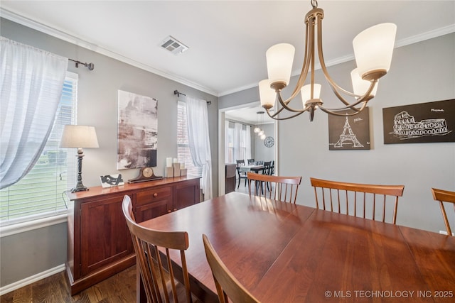 11710 S Willow St, Jenks, OK 74037 - dining space featuring a chandelier, dark wood finished floors, and crown molding