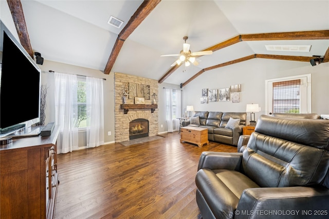 11710 S Willow St, Jenks, OK 74037 - living area featuring plenty of natural light, wood finished floors, a ceiling fan, and a fireplace