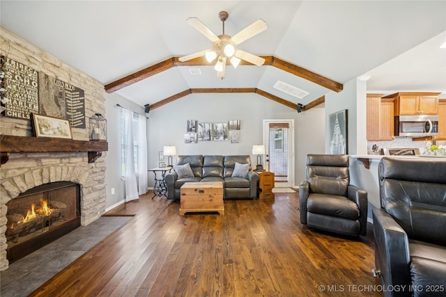 11710 S Willow St, Jenks, OK 74037 - living room featuring dark wood-style floors, ceiling fan, vaulted ceiling, and a fireplace