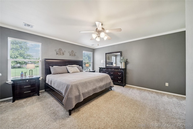 11710 S Willow St, Jenks, OK 74037 - bedroom with light colored carpet, ornamental molding, and a ceiling fan
