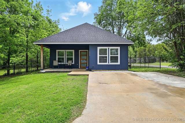 1325 Houston, Durant, OK 74701 - view of front of property featuring a porch and a shingled roof