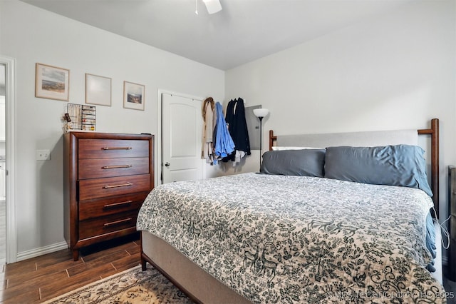 1325 Houston, Durant, OK 74701 - bedroom featuring dark wood finished floors and ceiling fan