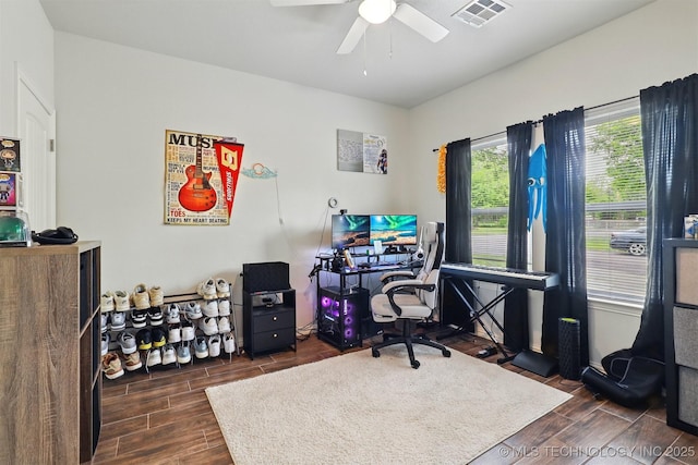 1325 Houston, Durant, OK 74701 - office area featuring dark wood finished floors and ceiling fan