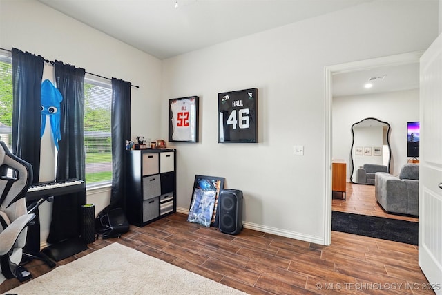1325 Houston, Durant, OK 74701 - office space featuring dark wood finished floors