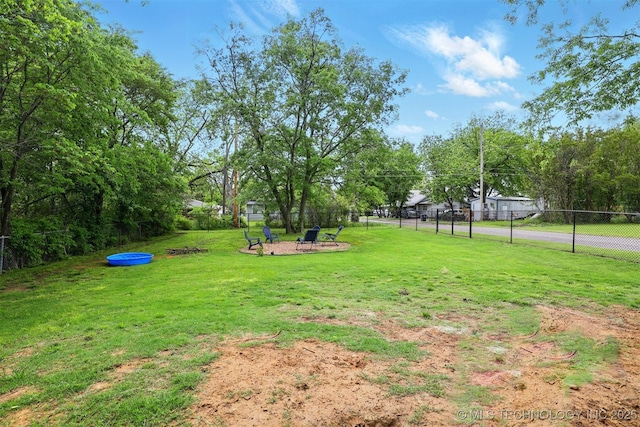 1325 Houston, Durant, OK 74701 - view of yard with view of wooded area