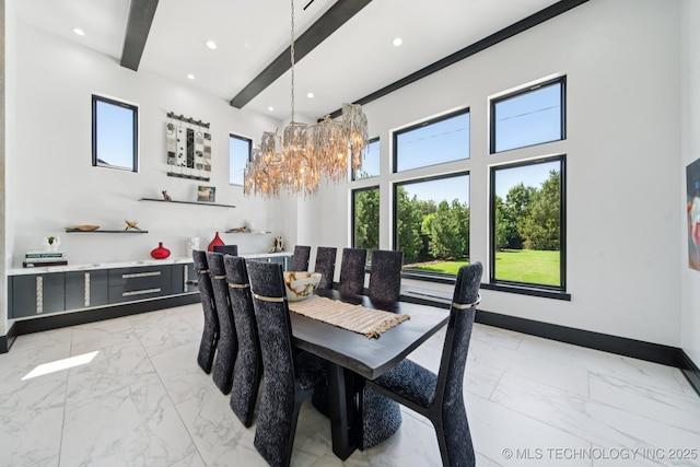 1226 W 109th Pl S, Jenks, OK 74037 - dining area with light marble finish floors, a towering ceiling, recessed lighting, plenty of natural light, and a chandelier