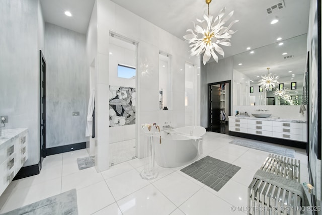 1226 W 109th Pl S, Jenks, OK 74037 - full bathroom with vanity, a freestanding tub, recessed lighting, a chandelier, and a tile shower