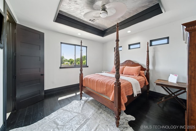 1226 W 109th Pl S, Jenks, OK 74037 - bedroom featuring a raised ceiling, wood-type flooring, and recessed lighting