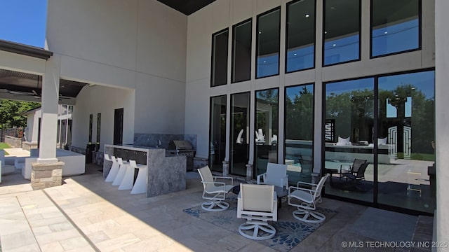 1226 W 109th Pl S, Jenks, OK 74037 - view of patio / terrace with an outdoor kitchen