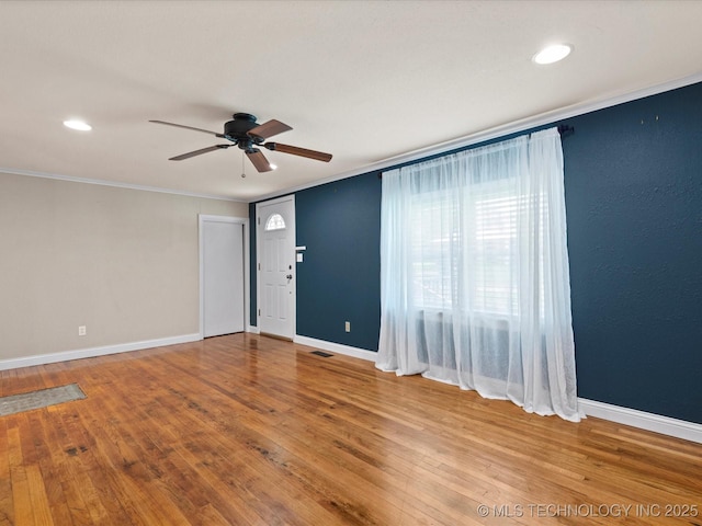 1322 Boundary Ave, Pawhuska, OK 74056 - unfurnished room with ornamental molding, ceiling fan, wood finished floors, and recessed lighting