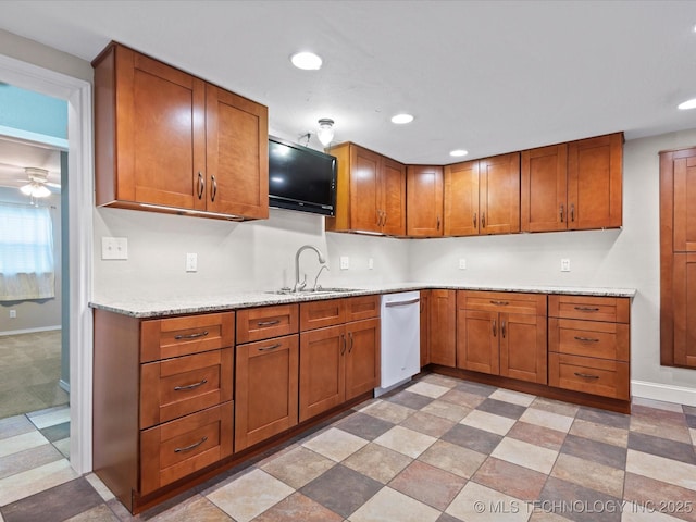 1322 Boundary Ave, Pawhuska, OK 74056 - kitchen featuring dishwasher, brown cabinets, recessed lighting, and ceiling fan