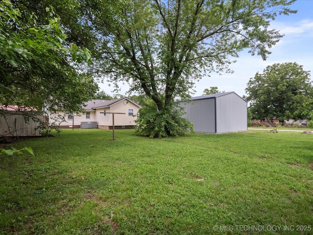 1322 Boundary Ave, Pawhuska, OK 74056 - view of green lawn with an outbuilding