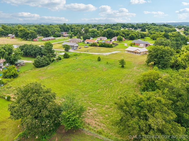 1102 W Main St, Beggs, OK 74421 - aerial view of a tree filled landscape