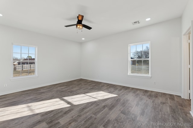 1102 W Main St, Beggs, OK 74421 - spare room with wood finished floors, ceiling fan, and recessed lighting