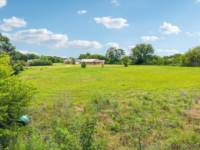 1102 W Main St, Beggs, OK 74421 - view of grassy yard with a view of rural / pastoral area