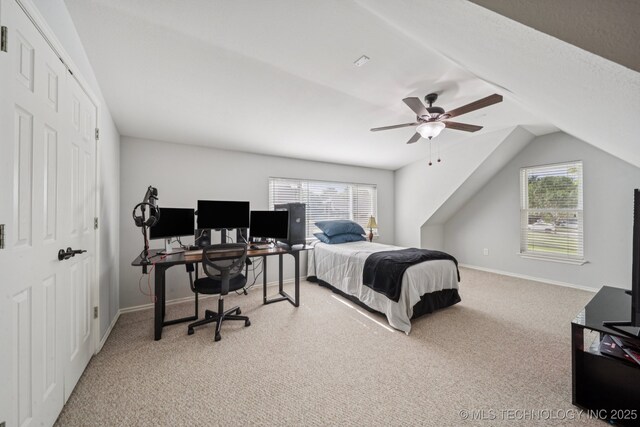 3701 W Dallas St, Broken Arrow, OK 74012 - carpeted bedroom with multiple windows, a ceiling fan, an office area, lofted ceiling, and a closet