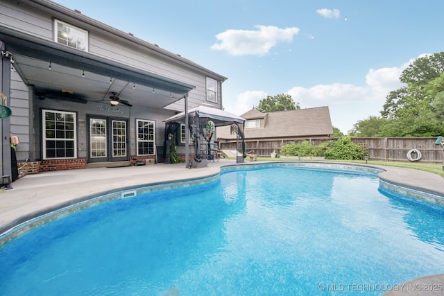 3701 W Dallas St, Broken Arrow, OK 74012 - view of swimming pool with a patio area, a fenced backyard, a ceiling fan, and a gazebo